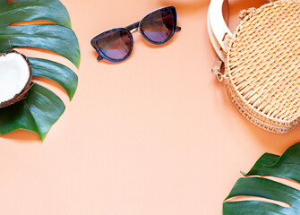 Summer vacation concept frame with straw bag and sunglasses. Top view. Copy space