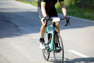cyclist with racing bike during road cycling race with sports clothing before arrival