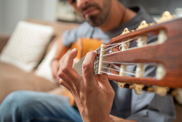 closeup of a guitar playing chord