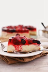 Cheesecake with jelly and fruits - 504458518