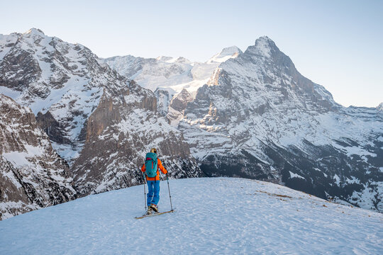 Woman ski touring in the alps of Switzerland