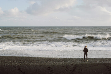 Man Standing on Beach