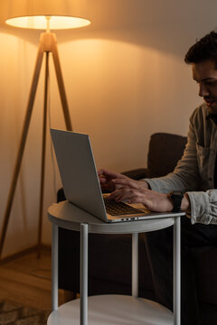 Man typing on laptop