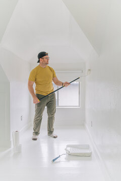 homeowner renovates bedroom with painting a wall