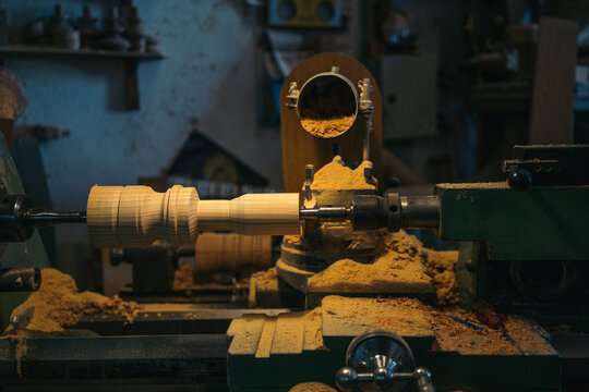 Carved wooden piece on carpentry lathe