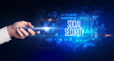hand holding wireless peripheral, cyber security concept
