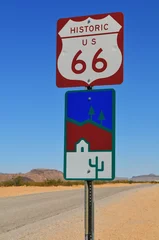 Foto auf Acrylglas Antireflex A road sign on the Historic Route 66 through the desert between Kingman and the wild west gold mining town of Oatman, Arizona, Southwest USA © Pedro