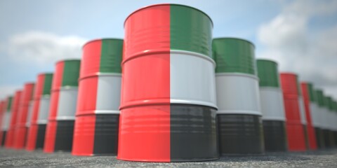 Many barrels with flag of the UAE. Oil or chemical industry supply related 3D rendering