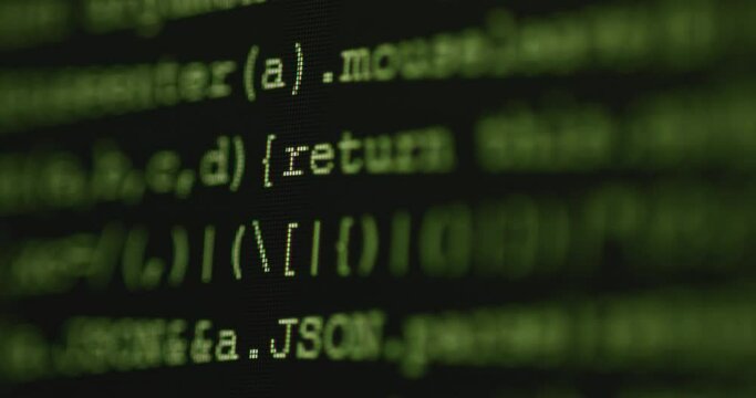 4K Close up shot programming tag code on PC Monitor scroll down. Background concept for programming and coding web development.