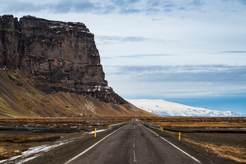 Route 1 / Ring Road (Hringvegur) leading towards the mighty Lómagnúpur mountain (764 m). Its...