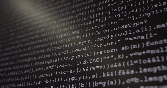 4K Close up shot programming tag code on PC Monitor scroll down. Background concept for programming and coding web development.