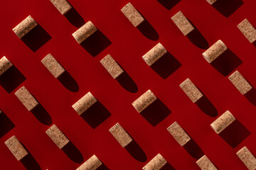 Red pattern with  wine bottle corks. alcoholic drinks poster concept

