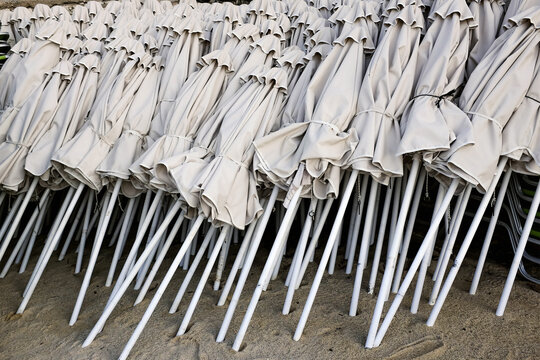Folded beach umbrellas
