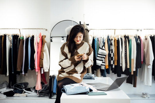 Portrait of clothing store owner