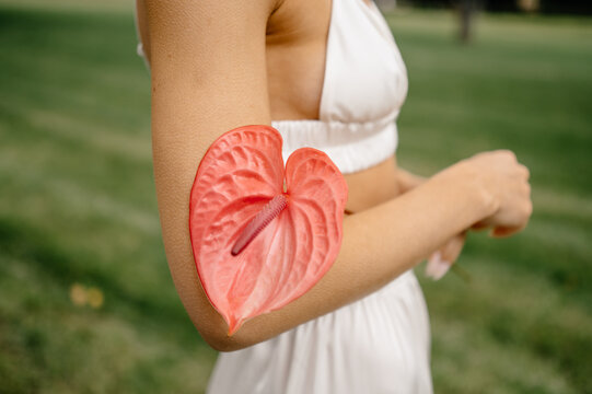 closeup Of female body With Goose Bumps  and calla flower