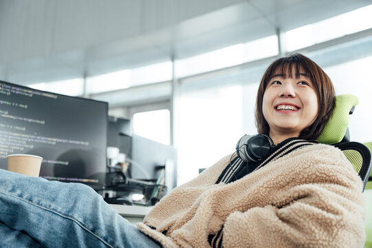 Young business woman smiling in office