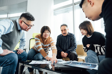 Group of business people brainstorming during a meeting