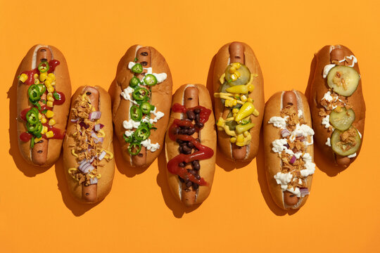 Finger food: grilled hot dogs with condiments and toppings