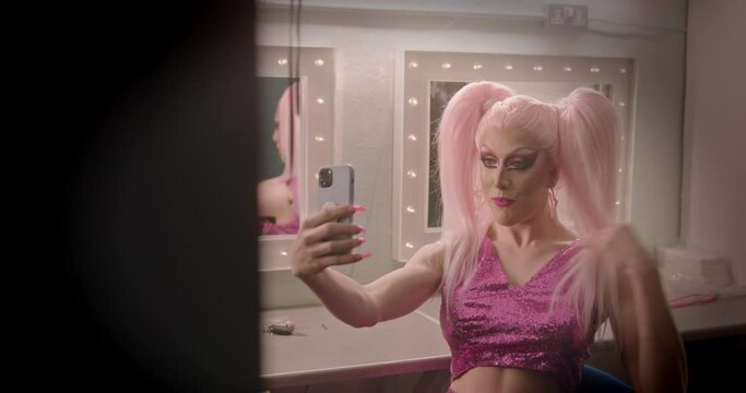 Drag Queen Backstage Taking Selfie On Smart Phone