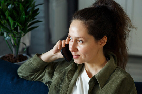 Woman having business phone conversation