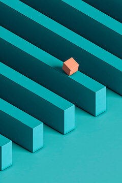 a Pink cube rolling down parallelepiped. with copy space