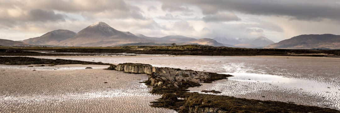 Ashaig Beach and Cuillin Mountains Isle of Skye Scotland