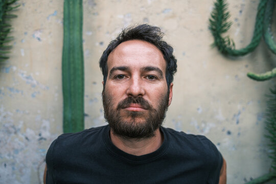 portrait of man looking at camera