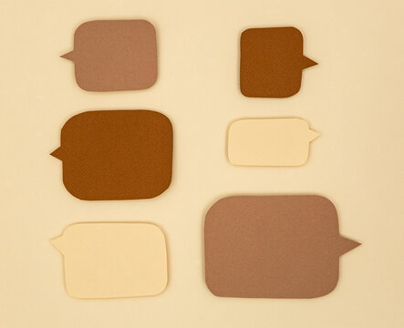 Speech bubbles in neutral tones 