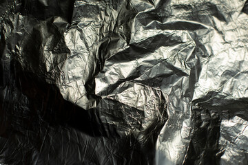 Foil texture. Wrinkled foil of ribbed color.