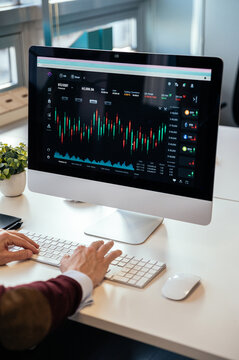 crop businessman working on computer in office