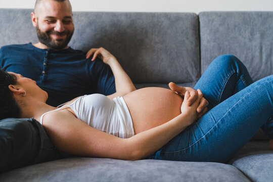 Pregnant Woman on the Sofa at Home