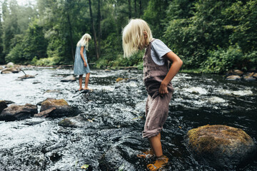 Children ford the river 