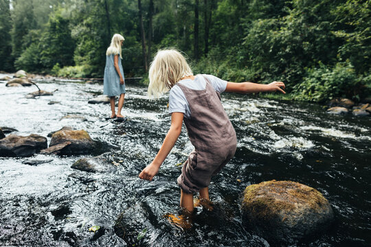Playing in the forest stream