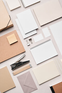 Blank notebooks with envelopes and stationery on desk