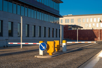 Yellow and blue blue barrier with arrow sign