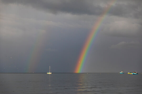 Rainbow on Ocean Horizon landscape in Costa Rica with boat