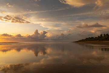 Stunning Sunset at beach with sky reflection in Costa Rica