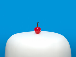 Simple white cake with a cherry on top
