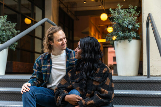 Couple Gaze Lovingly at One Another