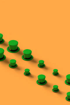 rows of green st.Patrick hats on orange background