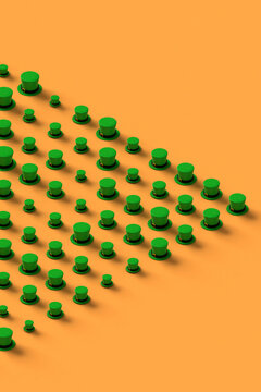 Collection of green st.Patrick hats on orange background