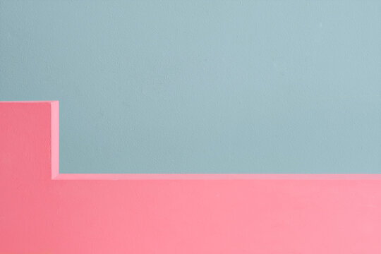 Pink podium on light blue paper background