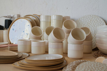 Handmade glasses and plates in a ceramic studio