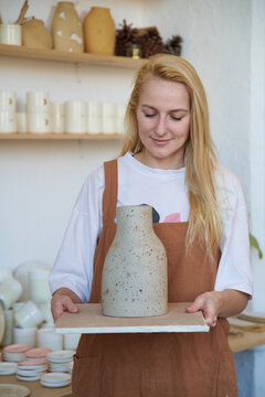Woman Potter With Final Handmade Glazed Products