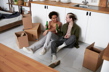 Young couple moving to new flat