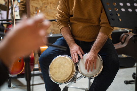 Close Up Of Man Playing Percussion