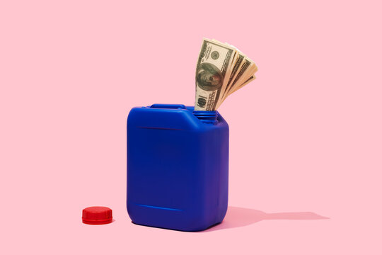 dollar notes in a blue jerry can