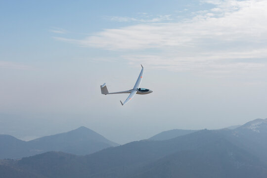 glider flies in the sky