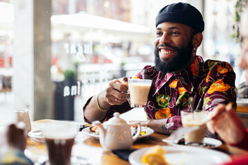 Man having breakfast in a cafe