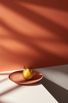 Yellow Pear On Clay Plate